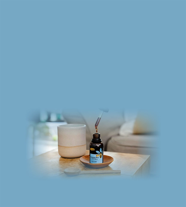 hand holding propolis high strength pfl30 extract dropper