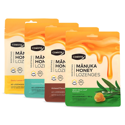 Four packages of Comvita Manuka Honey Lozenges on a white background