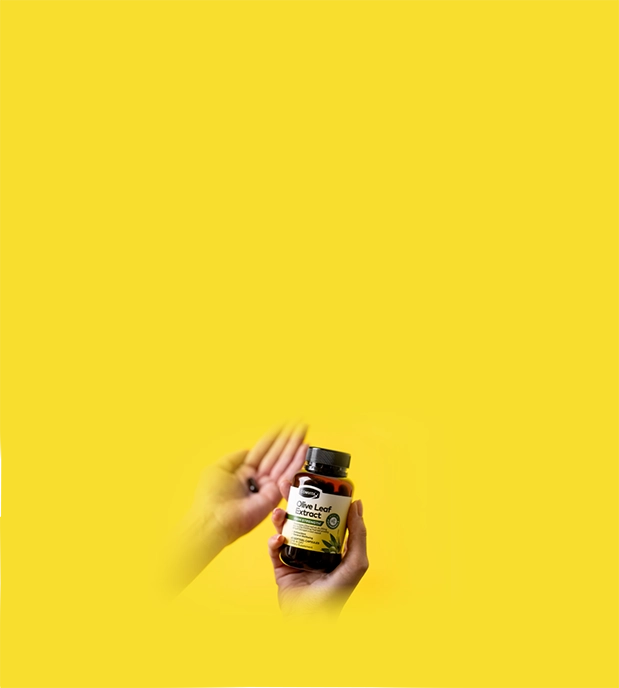 hand holding olive leaf extract high strength capsules